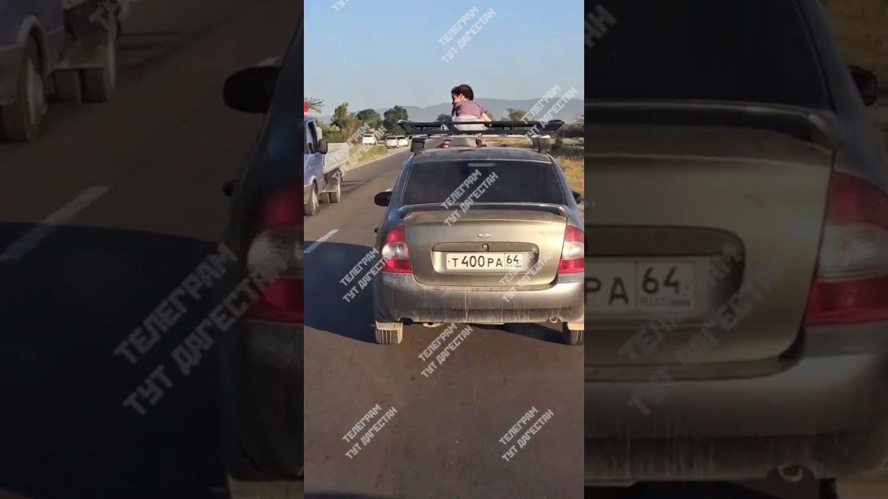 Маленького ребенка везли на крыше авто по оживленной трассе в Дагестане0